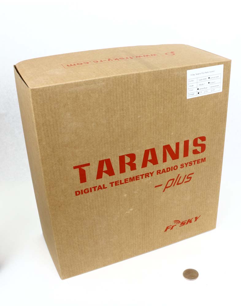 Taranis X9D plus radio with charger and lanyard in box
