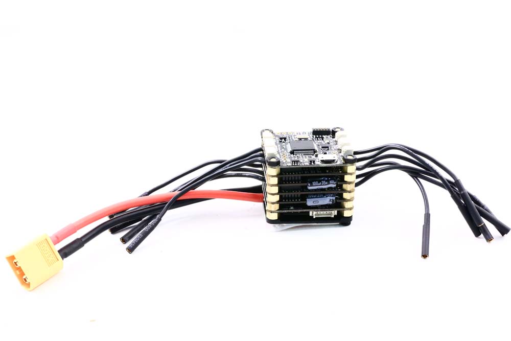Tbs Powercube esc flight controller stack for racing quads.- bullet connectors for easy motor connection & xt-60 connector for simple battery connection.