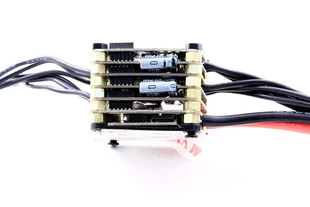 Tbs Powercube esc flight controller stack for racing quads.- side view.